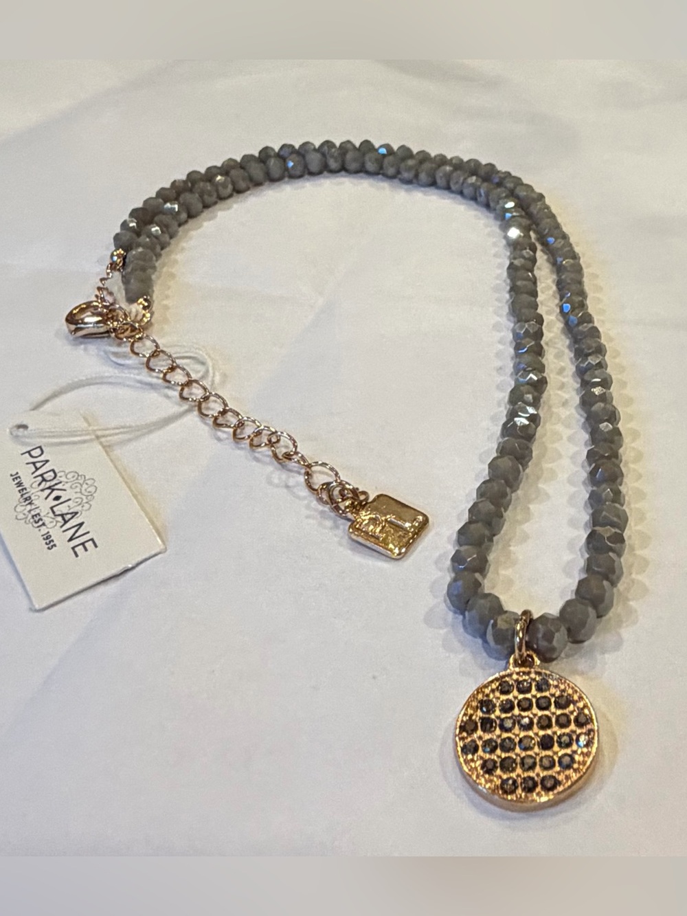 Elegant Gray Beaded Necklace with Gold Pendant by Park Lane